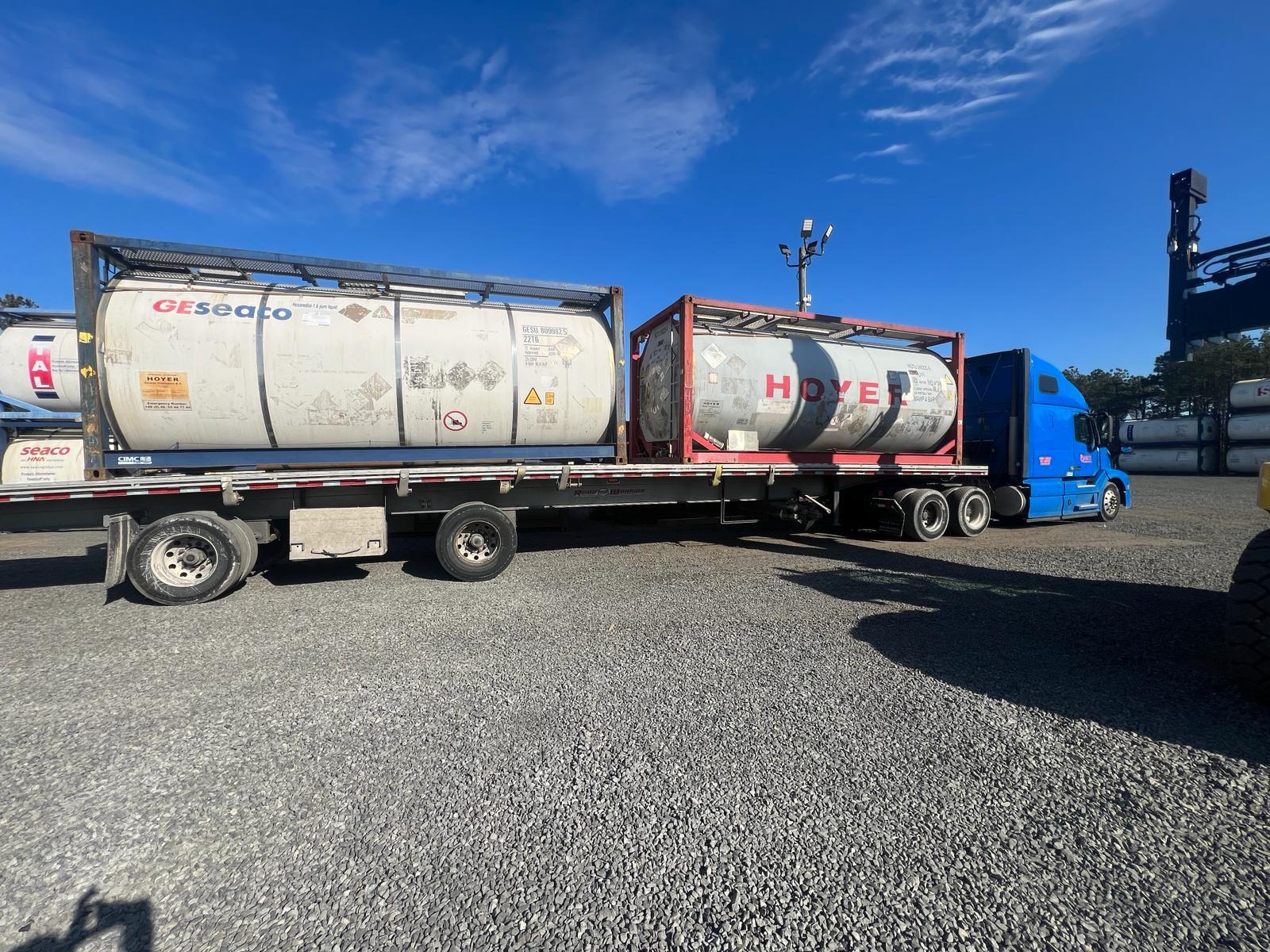 Intermodal containers on flatbed trailer